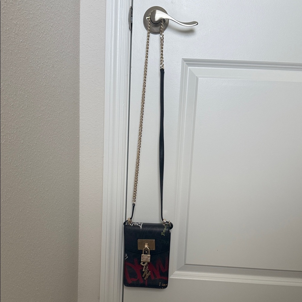 DKNY Stylish Black and Red Crossbody Bag